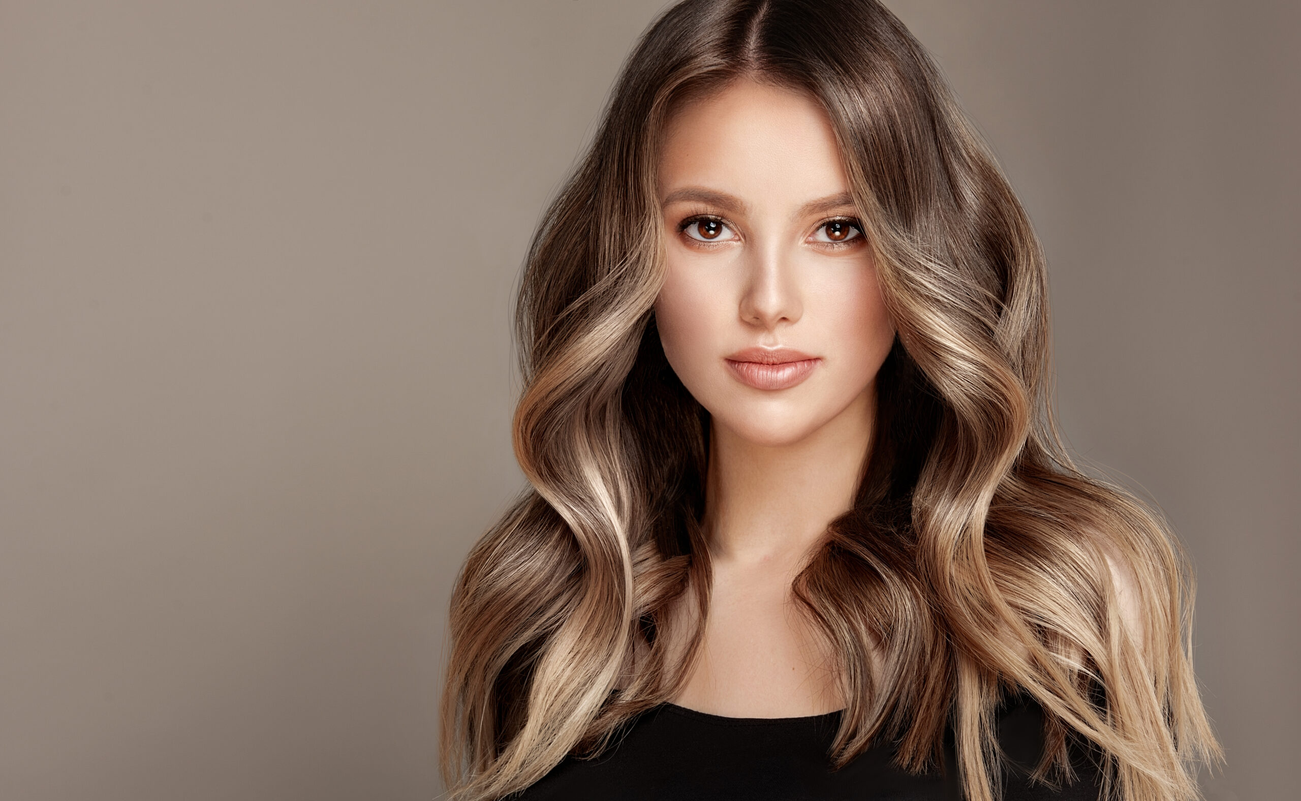 Beauty Girl With Long And Shiny Wavy Hair